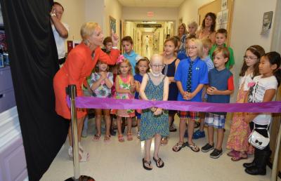 Brooke Mulford, 9, cuts the ribbon on Brooke’s Toy Closet, from which children in the hospital can receive a toy to brighten their stay, along with her classmates from Salisbury Christian School, and Denise Billing, President of the Peninsula Regional Medical Center Foundation. Brooke Mulford, 9, cuts the ribbon on Brooke’s Toy Closet, from which children in the hospital can receive a toy to brighten their stay, along with her classmates from Salisbury Christian School, and Denise Billing, President of the Peninsula Regional Medical Center Foundation.